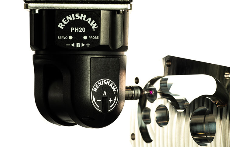 A coordinate measuring machine probe attached to a metal fixture.