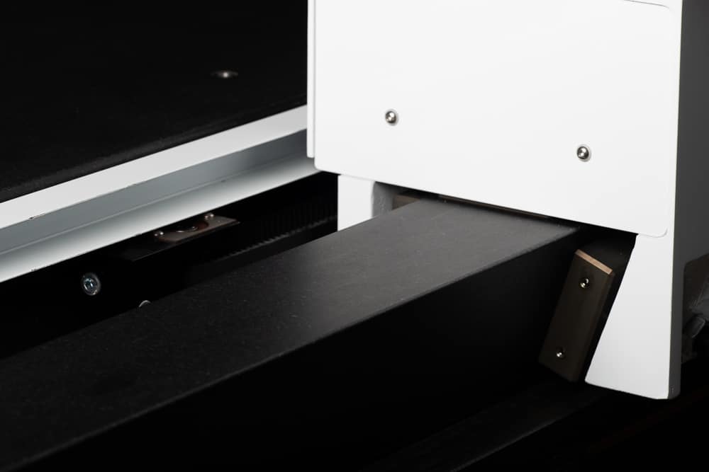 Close-up of the Micron II's homogenous granite platform and triangular bridge design, showcasing its precision engineering for stability and accuracy.